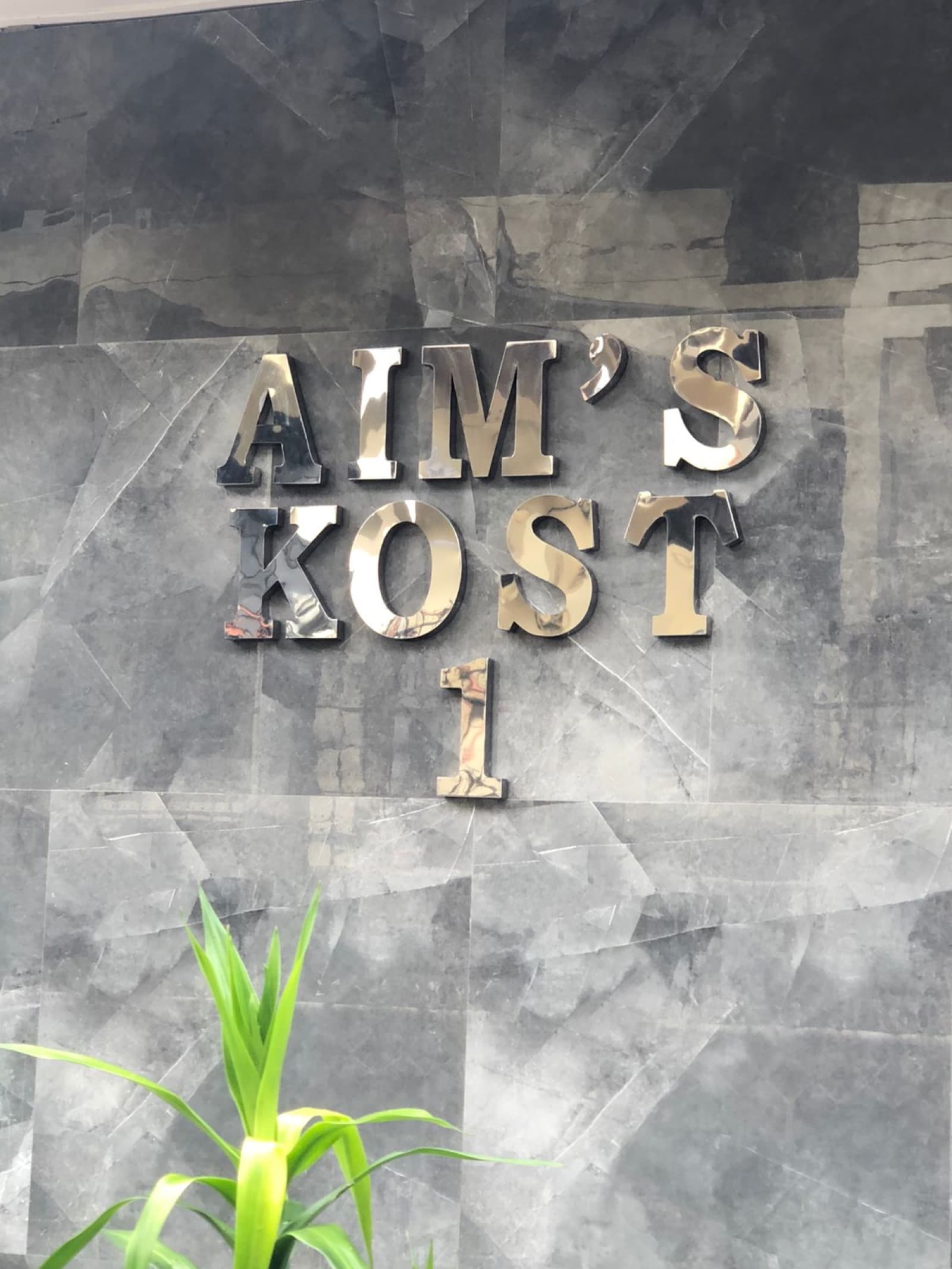 Signage AIM's Kost 1